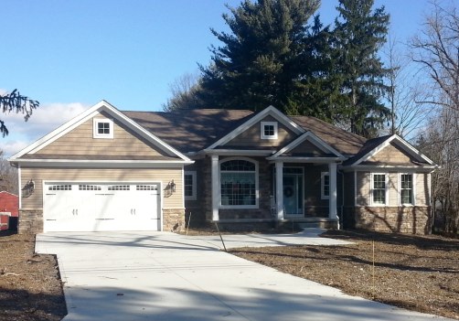 10' foyer, den and great room with corner fireplace and optional coffered ceiling. Kitchen with large walk-in pantry and island/breakfast bar. Master suite with boxed ceiling and master bath with double sinks and walk-in closet with optional entry into Laundry room. Front covered porch with craftsman details, optional rear covered porch with patio, 2 car front entry garage, 3-car, side entry optional.