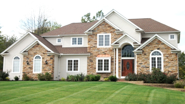 4 bedrooms. 4 baths. Large 2nd floor master bedroom with cathedral ceiling and attached sitting room. 2 story foyer. 1st floor study/den. Formal dining room and sunroom with tray ceiling and optional built-ins. Large great room. Large kitchen with attached laundry/mud room. Side entry 3-car garage. 