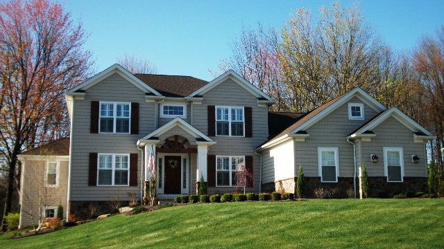 1st floor master with round box ceiling. Bridge overlooking 2 story foyer and great room with high windows and loft above. Formal dining room or parlor with tray ceiling. 1st floor office/den. Optional shake siding front. Kitchen with breakfast bar and walk-in pantry. 1st floor laundry/mud room. Arched wood beam covered porch. 2-car front-entry garage (optional 3-car side entry). Unfinished optional 296 sq. ft. bonus room or 4th bedroom.