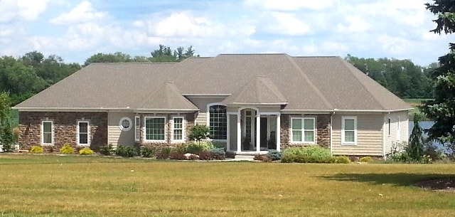 9' ceilings. Parlor/den with French doors. Vaulted 12' 4