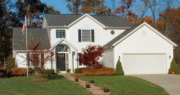 1st floor den/bedroom with boxed 9' ceiling. 2 story foyer with bridge over. Sunk-in family room with high ceiling and fireplace. Formal parlor/dining room with tray ceiling and sunburst ceiling detail. Arched covered porch. 2-car garage. Optional bonus room.