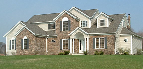 Formal dining room. 2-story foyer with bridge above. Vaulted great room. Dinette and kitchen open to loft above. 1st floor parlor/den with French doors. Large master with 2 walk-in closets. 'Barrel' arched covered porch. 2-car side-entry garage. Optional 240 sq. ft. bonus room or bedroom #4 and/or optional 136 sq. ft. morning room.