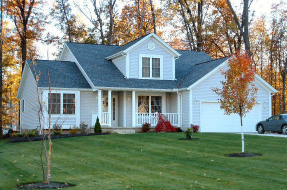 2 story great room with fireplace and foyer. 1st floor master bedroom with cathedral ceiling and large master bath. Tray ceiling in formal dining room with cased opening. Large covered front porch. 1st floor laundry. 2-car front-entry garage.